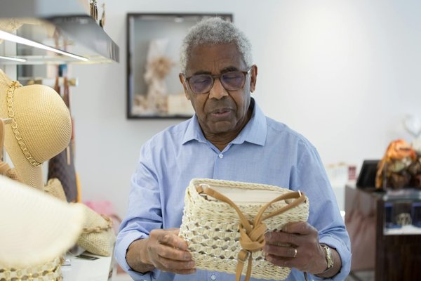 How do seasonal changes affect the fabrics and colors you should wear?